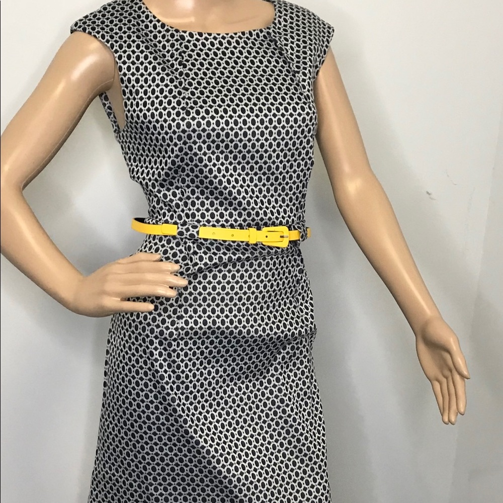 Blue white dress with a yellow belt